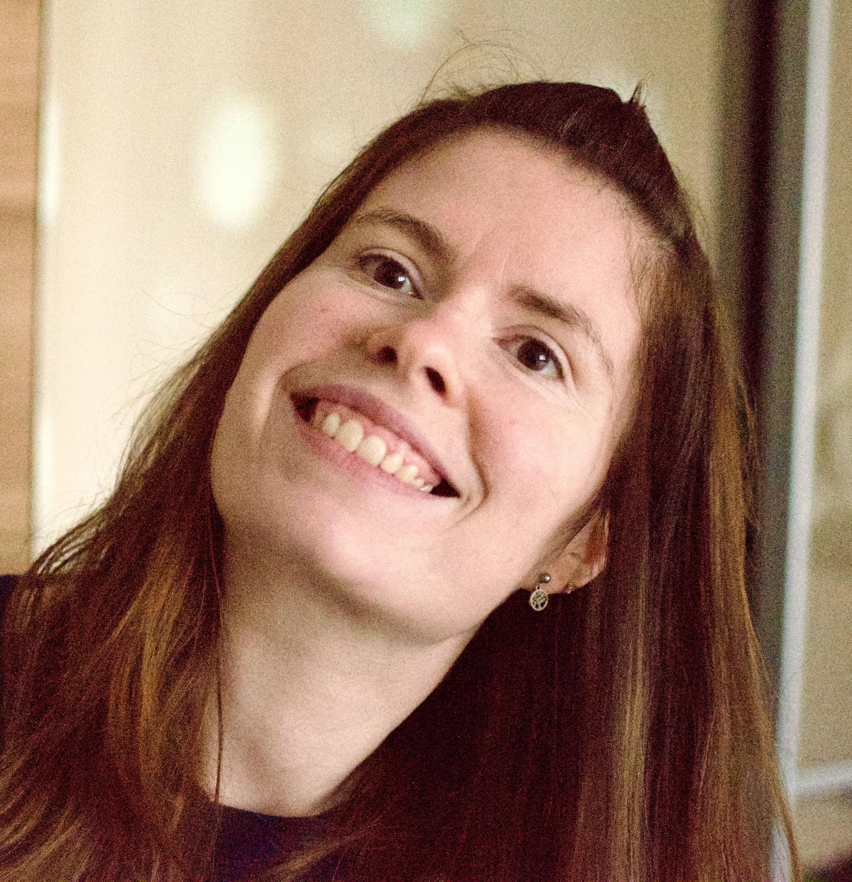 Reni lächelt freundlich in die Kamera